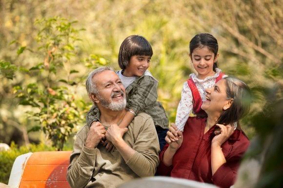 Grandparents with grandchildren in park