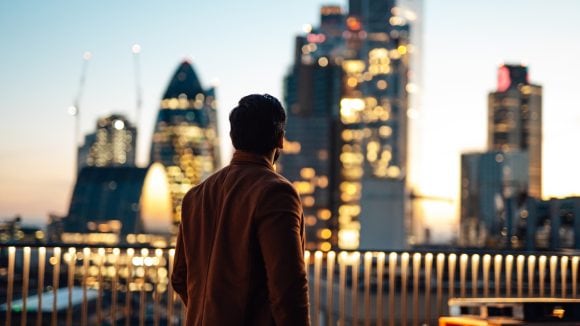 A man looking at building view