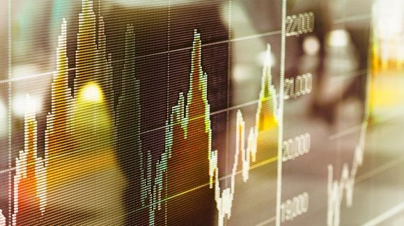 Electronic display of a stock chart showing up and down direction