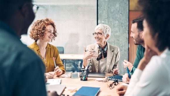 Group in office during meeting