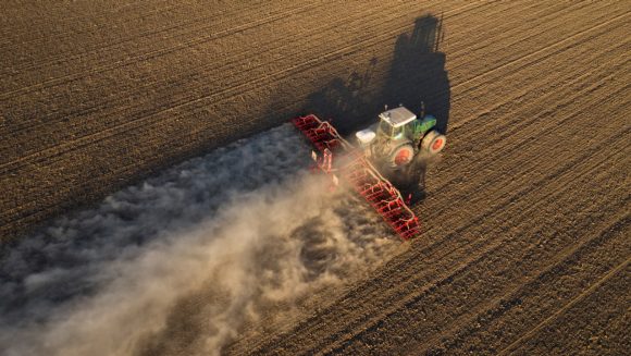 Tractor sowing seed
