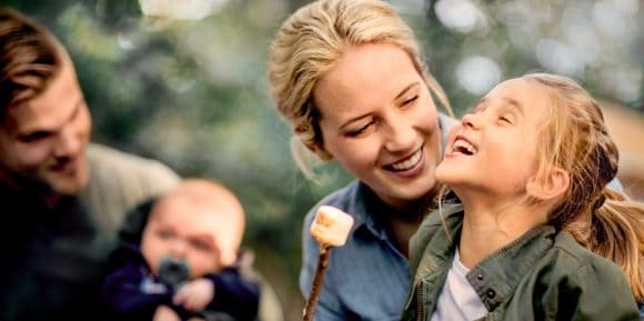 Family eating marshmallows