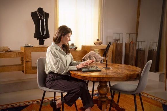 Two women talking at the office table