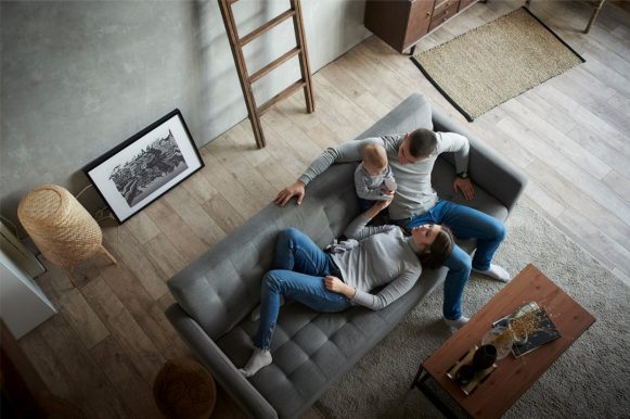 Family lying on the couch