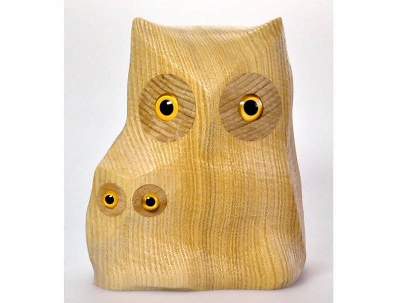 The owl Esmeralda and her son Sebastian as an icon of Swiss design