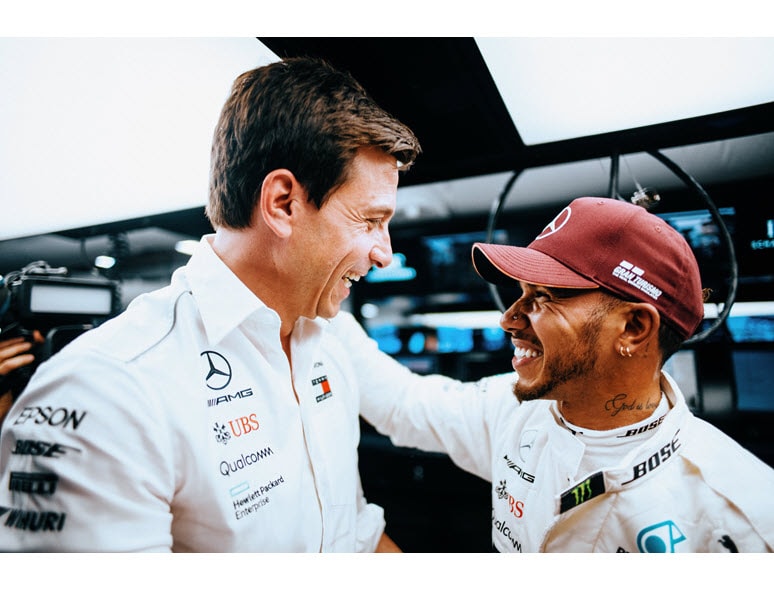 Mercedes-AMG PETRONAS F1 Team Principal & CEO, Toto Wolff, with driver Lewis Hamilton