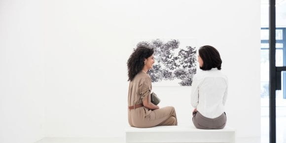 2 ladies communicating