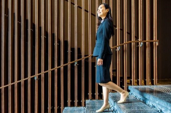 Woman walking down the stairs