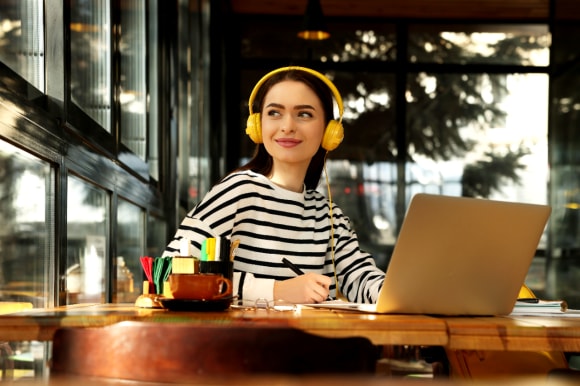 Women is using headphones