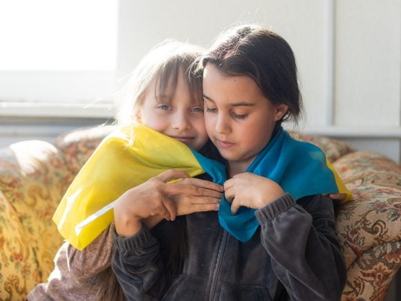 Girls sheltering from bomb