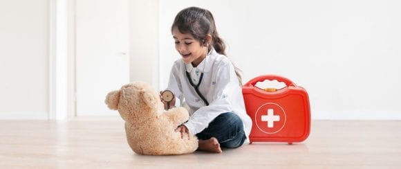 Small girl playing with toy