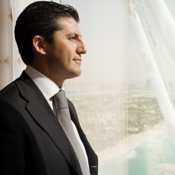 Businessman looking out of window