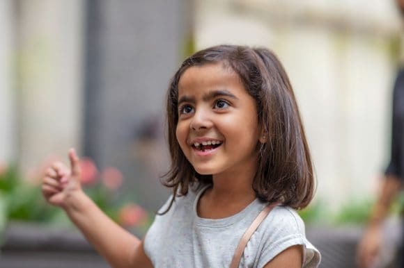 Young Indian girl smiling
