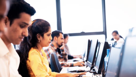 Group of people working on computer