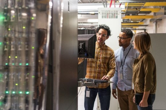 Technicians in server room