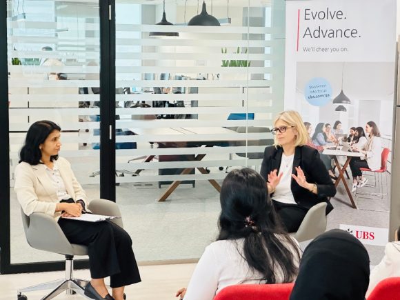 Mitra discussing over a meeting