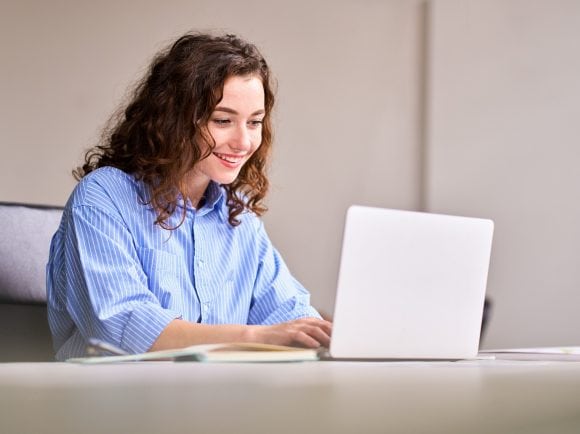 Platform developer working on laptop