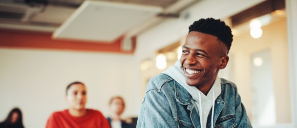Boy smiling during Off-Cycle internship