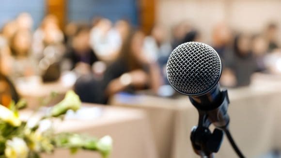 Conference room with microphone in the foreground
