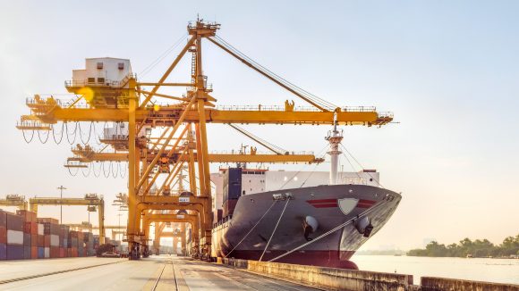 Container cargo ship at pier