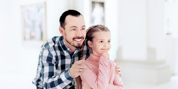 A man and a girl in the Museum