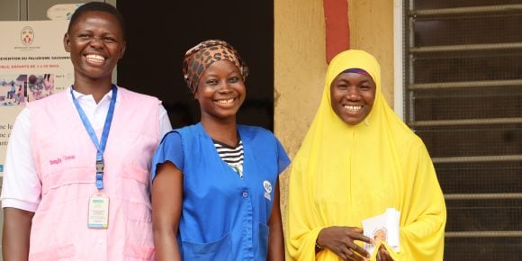 Smiling healthcare workers together