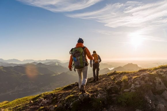Two people hiking in mountains