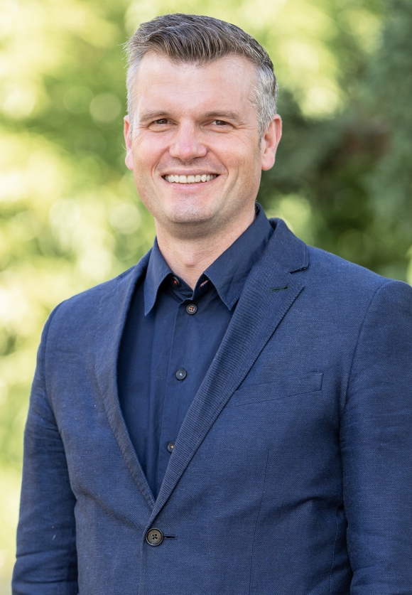 Portrait of Tom Hall, CEO UBS Optimus Foundation