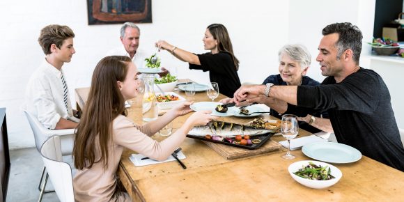 Big happy family having dinner together