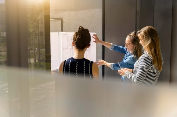 Colleagues discussing plans