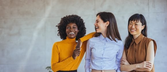 Three corporates-womens laughing