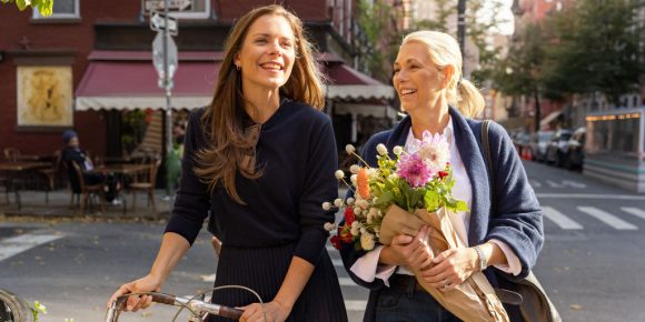 mother and daughter walking on the street