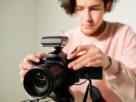 Person is holding camera