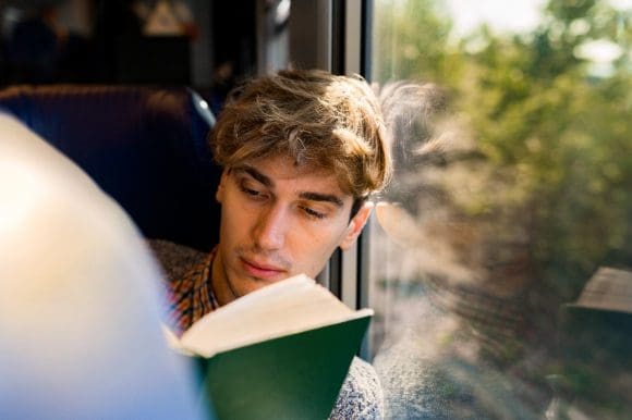 Man is reading book