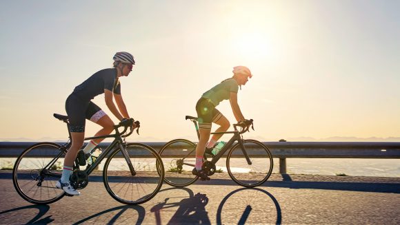 Two women cycling