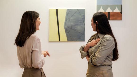 Women observing art