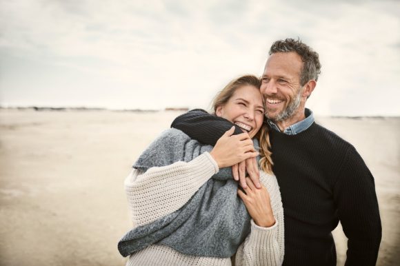 Couple standing on a beach