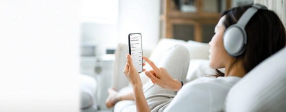 Women scrolling on her smartphone