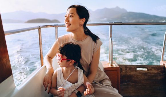 Mother and daughter on boat trip