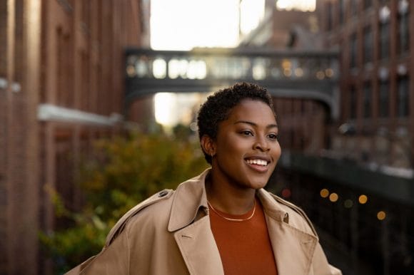 Brown women smiling