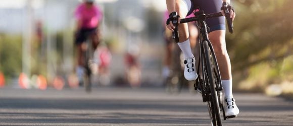 Cyclist leading a road race