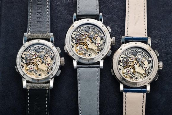 a group of watches with leather straps