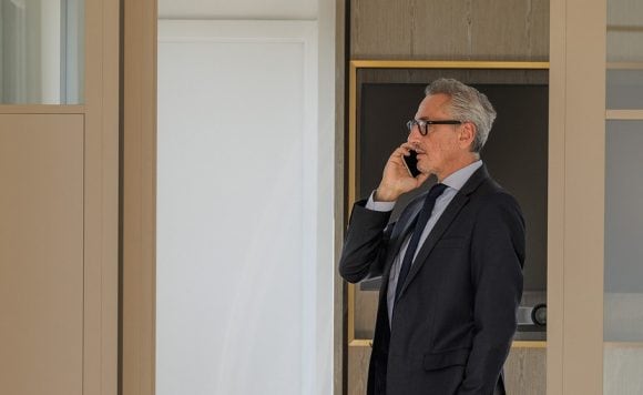 man talking over call