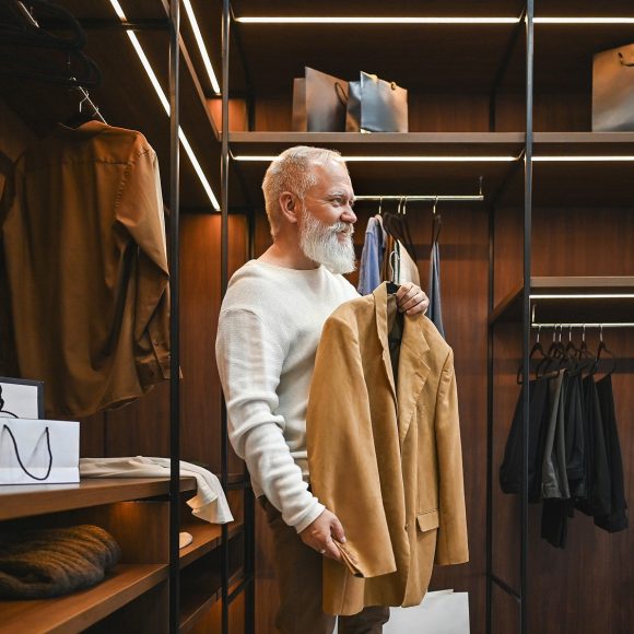 Man trying on sport coat