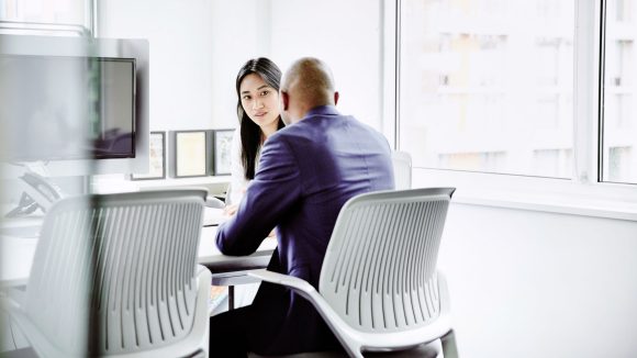 two colleagues in meeting