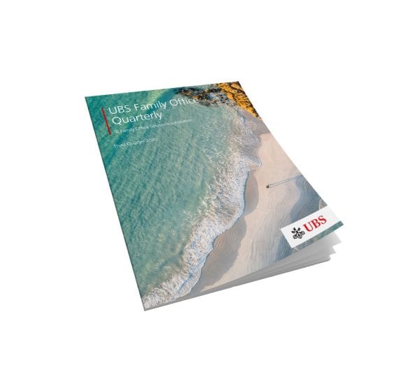 Cover of quarterly report shows a beach with mint green sea