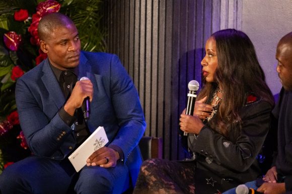 Wale Ogunleye and Bisa Butler speaking on stage