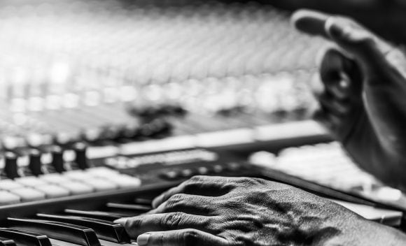 Musician plays keyboard