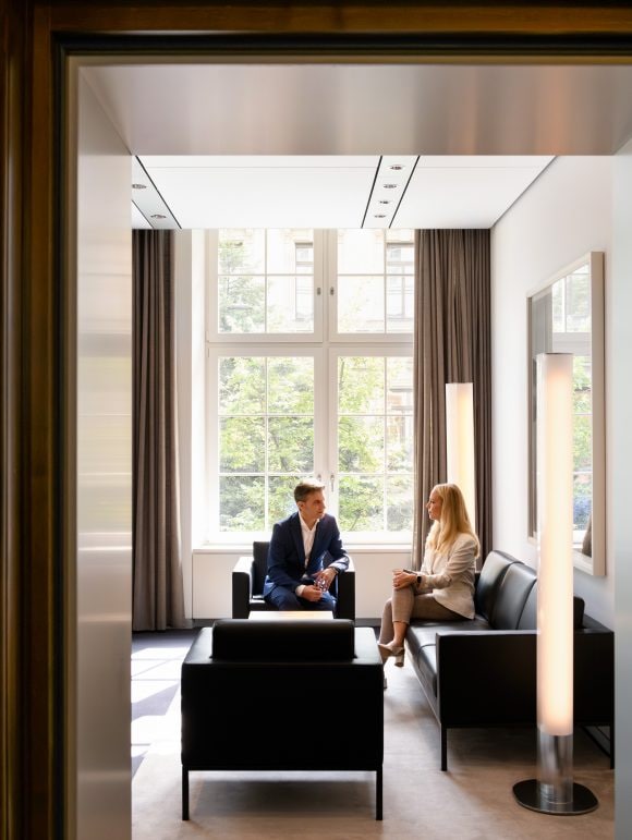 Two people having meeting at UBS headquarter Bahnhofstrasse 45, Zurich